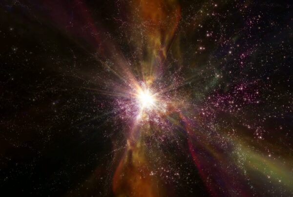 A 4K video loop of a bright supernova explosion in a galaxy, surrounded by stars and colorful cosmic gas in space.