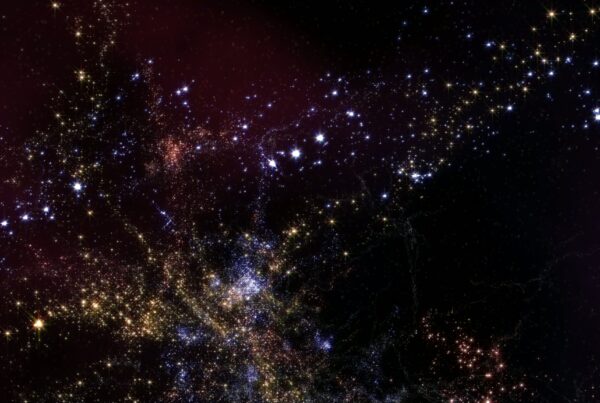 A stunning 4K video loop of a star-filled cosmic landscape highlighting bright star clusters and nebulae.