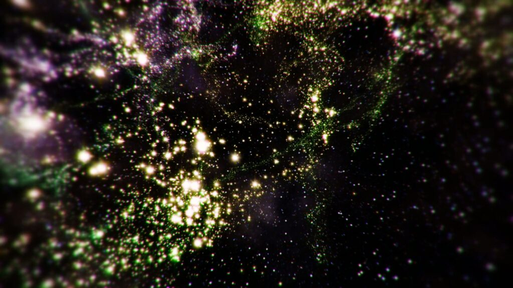 A stunning video loop of a galaxy displaying numerous twinkling stars in a vast cosmic field, with shimmering lights ranging from white to green against a dark, expansive background.