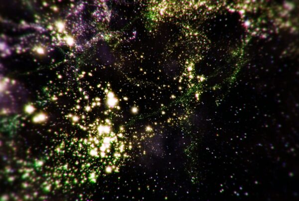 A stunning video loop of a galaxy displaying numerous twinkling stars in a vast cosmic field, with shimmering lights ranging from white to green against a dark, expansive background.