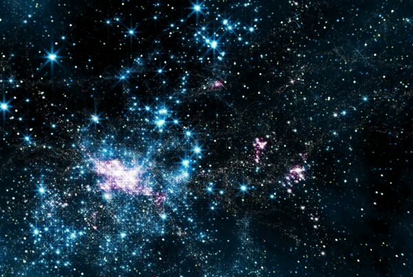 A breathtaking video loop of the cosmos featuring countless twinkling stars in blue and white hues, set against a deep black background with hints of cosmic dust and gas clouds.