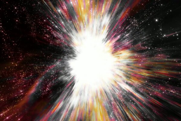 Vibrant video animation of a cosmic explosion with radiant white light and colorful beams symbolizing the Big Bang in a star-filled universe.