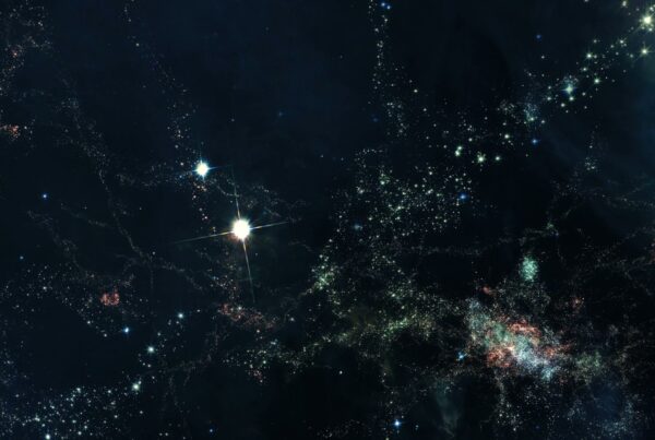 A breathtaking animation loop of a star-filled night sky showing a vast galaxy with two bright stars at the center, surrounded by constellations and nebulae in shades of pink and green.