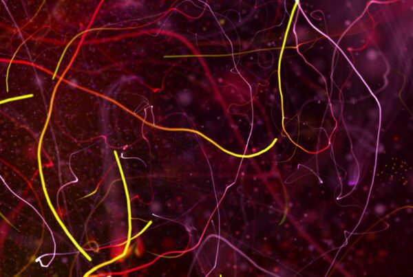 4K video loop of a vibrant abstract 3D animation featuring colorful, wispy lines and bright particles against a dark background, creating a sense of chaos and energy.