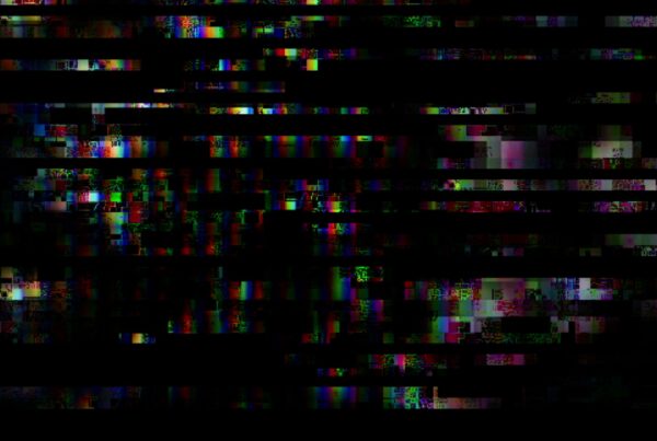 Abstract glitch 4K video loop with colorful pixelated patterns and dark horizontal bars.