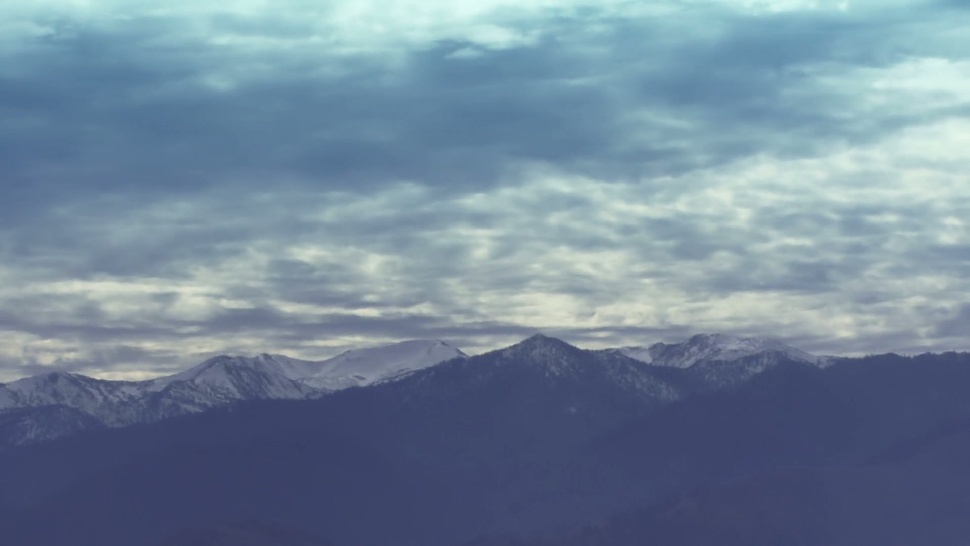 Time-Lapse Clouds Over Mountains