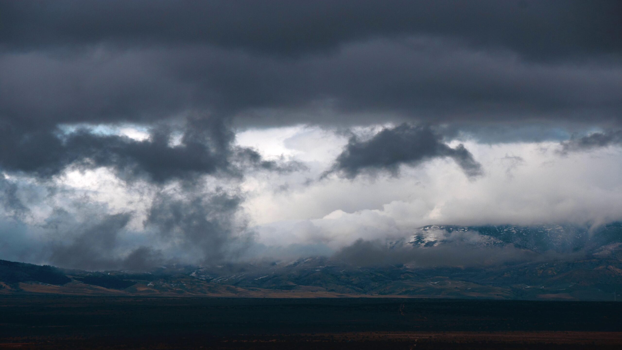 Time-Lapse Storm Clouds Over Mountain Peaks