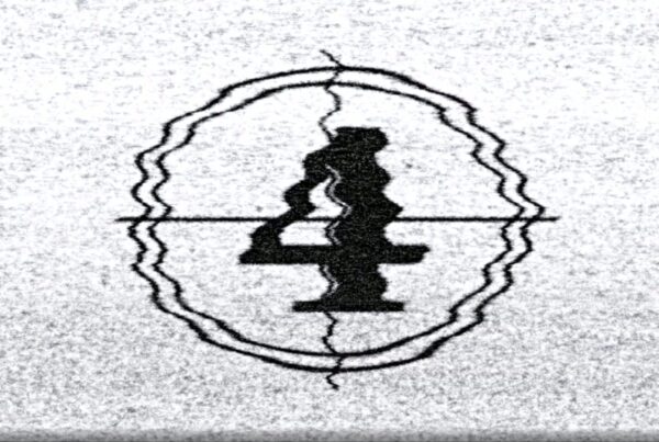 Animation of a black and white static-filled screen with a distorted symbols counting down, surrounded by an irregular border.