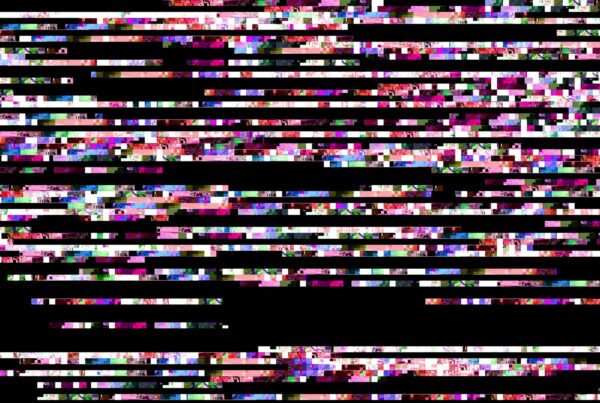Colorful glitch art video loop displaying horizontal lines and pixelated blocks in bright pinks, purples, blues, and greens, creating an abstract and chaotic digital design.