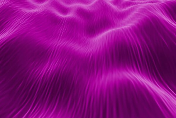 Abstract looping video depicting flowing purple waves with a silky texture, creating a sense of movement and tranquility.