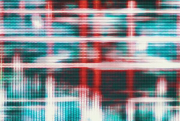 Close-up of a vibrant red and blue abstract digital video loop pattern with pixelated texture resembling an LED screen, highlighting modern and technological themes.