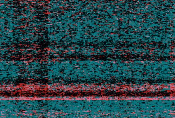 Abstract 4K video loop glitch texture with red and blue pixelated noise, digital interference effect.