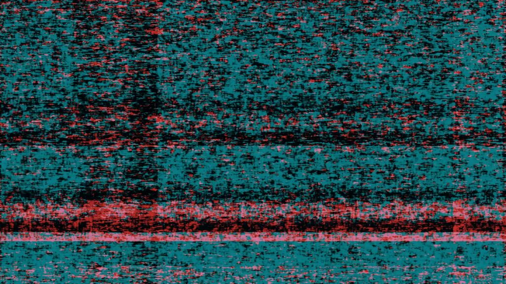 An abstract video loop of glitch art featuring a vibrant pixelated texture with cyan and red colors, evoking dynamic digital static and disruption.