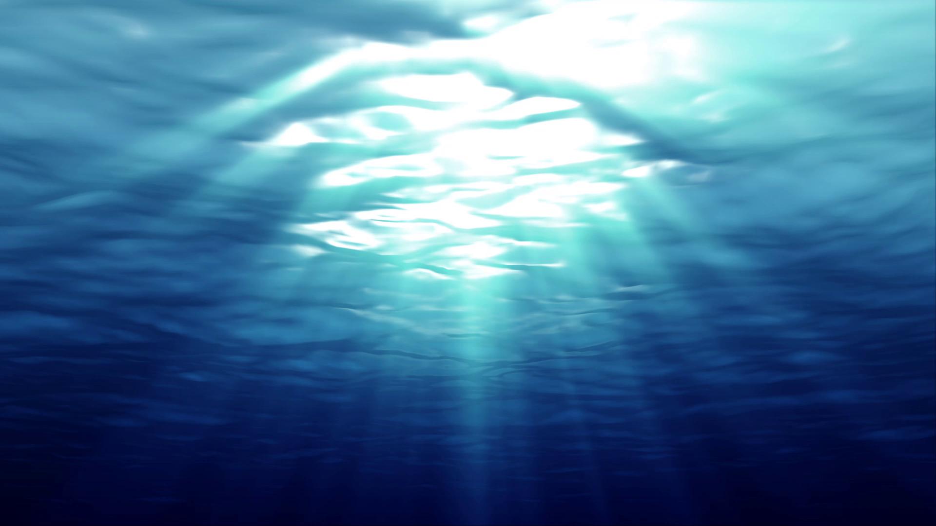 Sunlight Dances Through Ocean Depths HD Loop