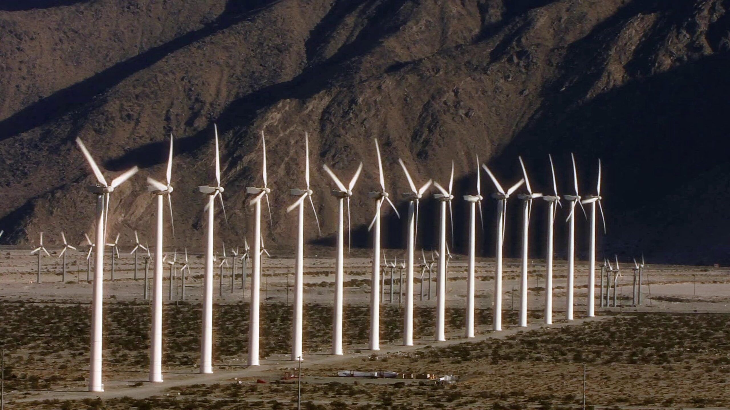 Wind Power Across Desert Mountains 4K Video