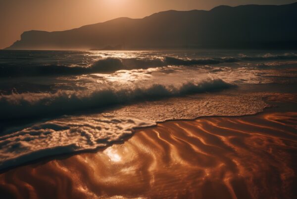 A breathtaking beach sunset with golden sand and gentle waves.