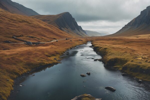 Scenic mountain valley with river, autumn colors in landscape.