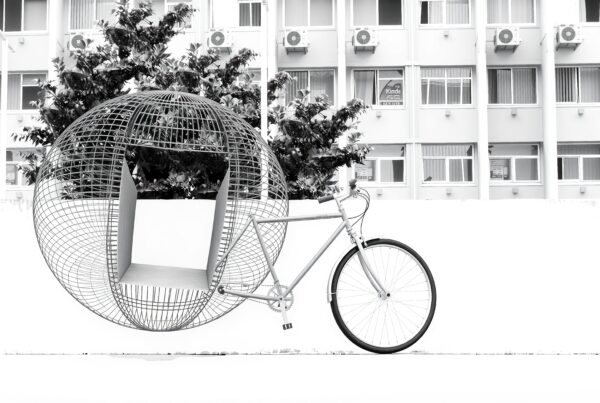 Monochrome bicycle with spherical artistic structural design.
