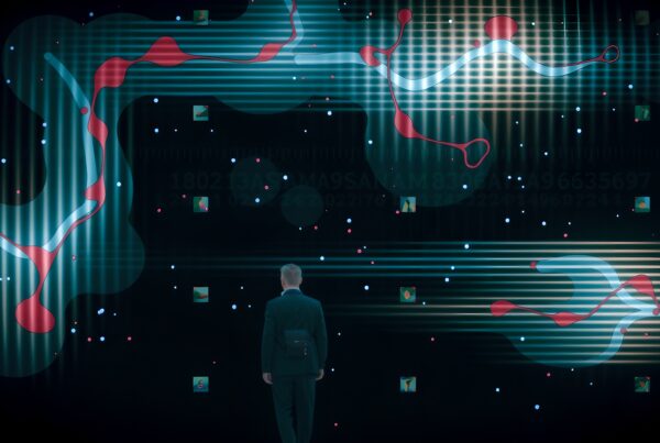 A person in a suit explores a digital, abstract world filled with shapes and light.