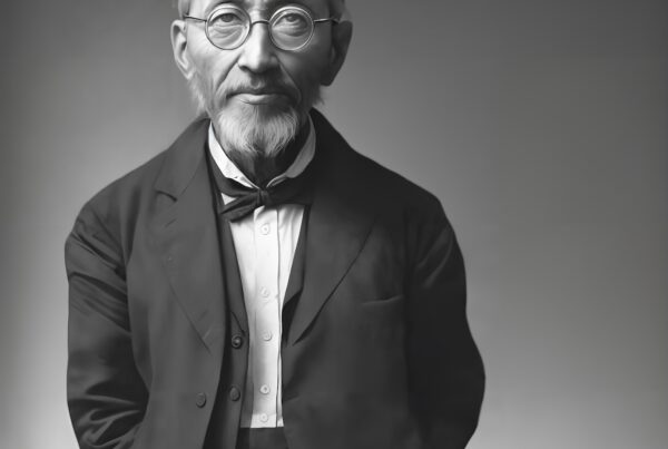 A distinguished elderly man wearing glasses and a formal suit with a bow tie, exuding wisdom and elegance.