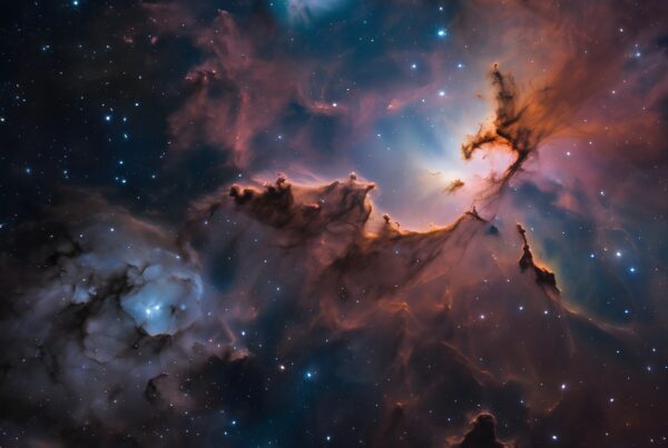 Vibrant nebula with colorful cosmic clouds and bright stars.
