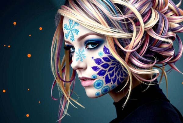 A woman with colorful face paint and vibrant hair against a teal background with orange accents.