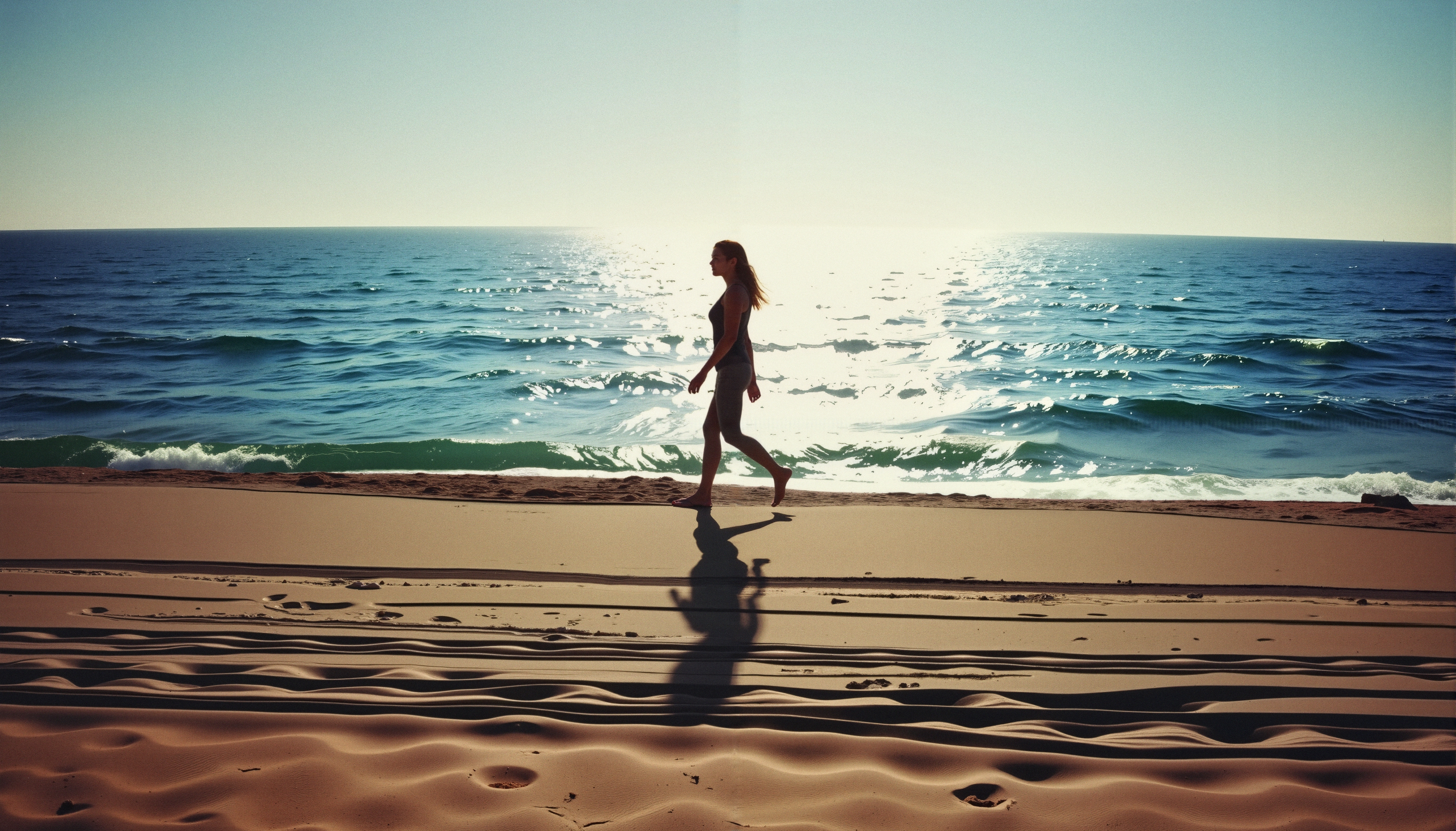 Woman Strolling By Ocean Waves
