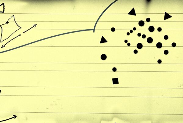 An abstract collection of shapes on vintage yellow lined paper featuring bold geometric figures and hand-drawn elements.