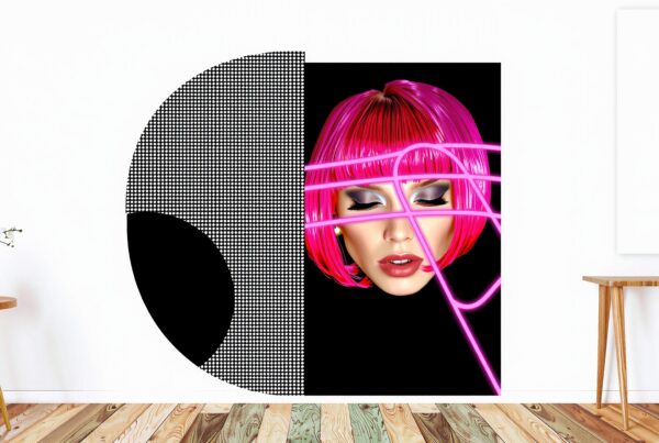 A contemporary room with vibrant pop art featuring a woman’s face and pink neon lights on a geometric background.