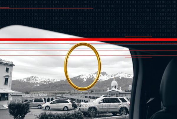 A surreal blend of digital elements with a mountainous landscape viewed from a car window.