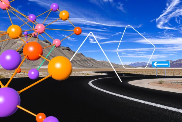 Vibrant abstract network in desert landscape beneath blue sky.