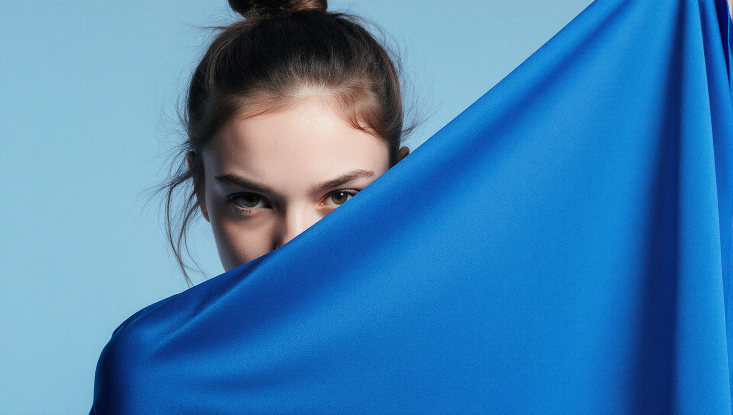 Mysterious Gaze Behind Blue Fabric