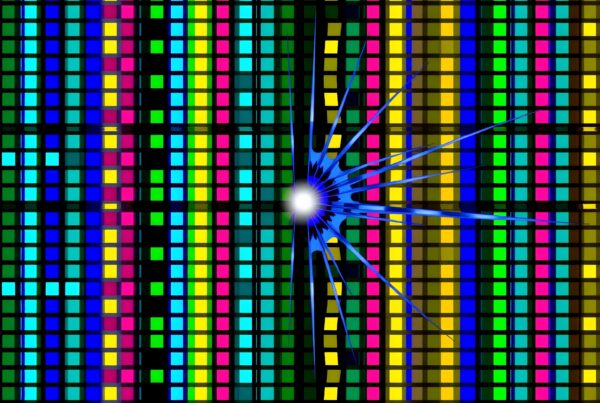 Abstract art with colorful grid pattern and starburst design.
