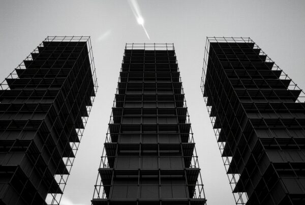 Dramatic urban skyline with towering structures.