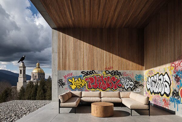 Contemporary outdoor space with graffiti and golden dome.