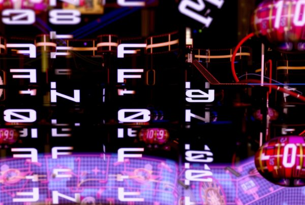 A futuristic digital display with glowing numbers and an intricate neon-colored design.