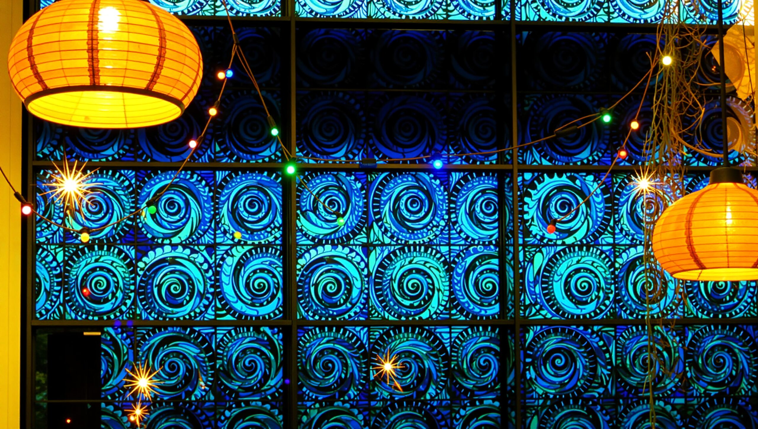 Vibrant Window with Lanterns