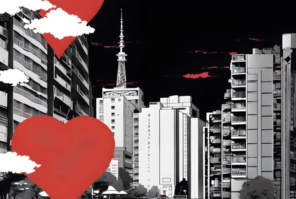 A striking black and white urban cityscape with bold red hearts.