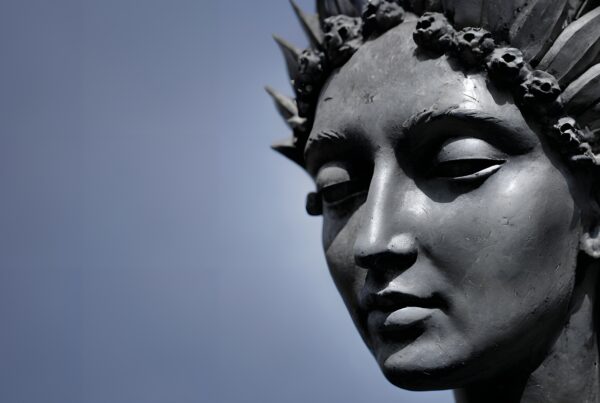 Serene Metallic Woman Sculpture