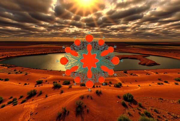Sunlit desert landscape with reflective water and abstract geometric overlay.