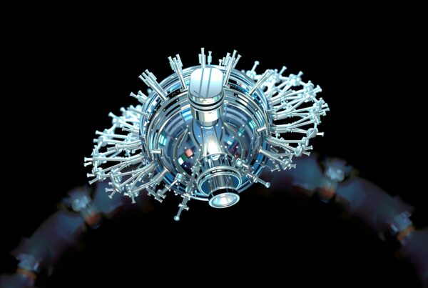 Image of a futuristic satellite with metallic components radiating outward against a dark background.