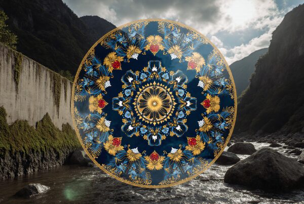 A vibrant mandala hovers over a peaceful river with mountains.
