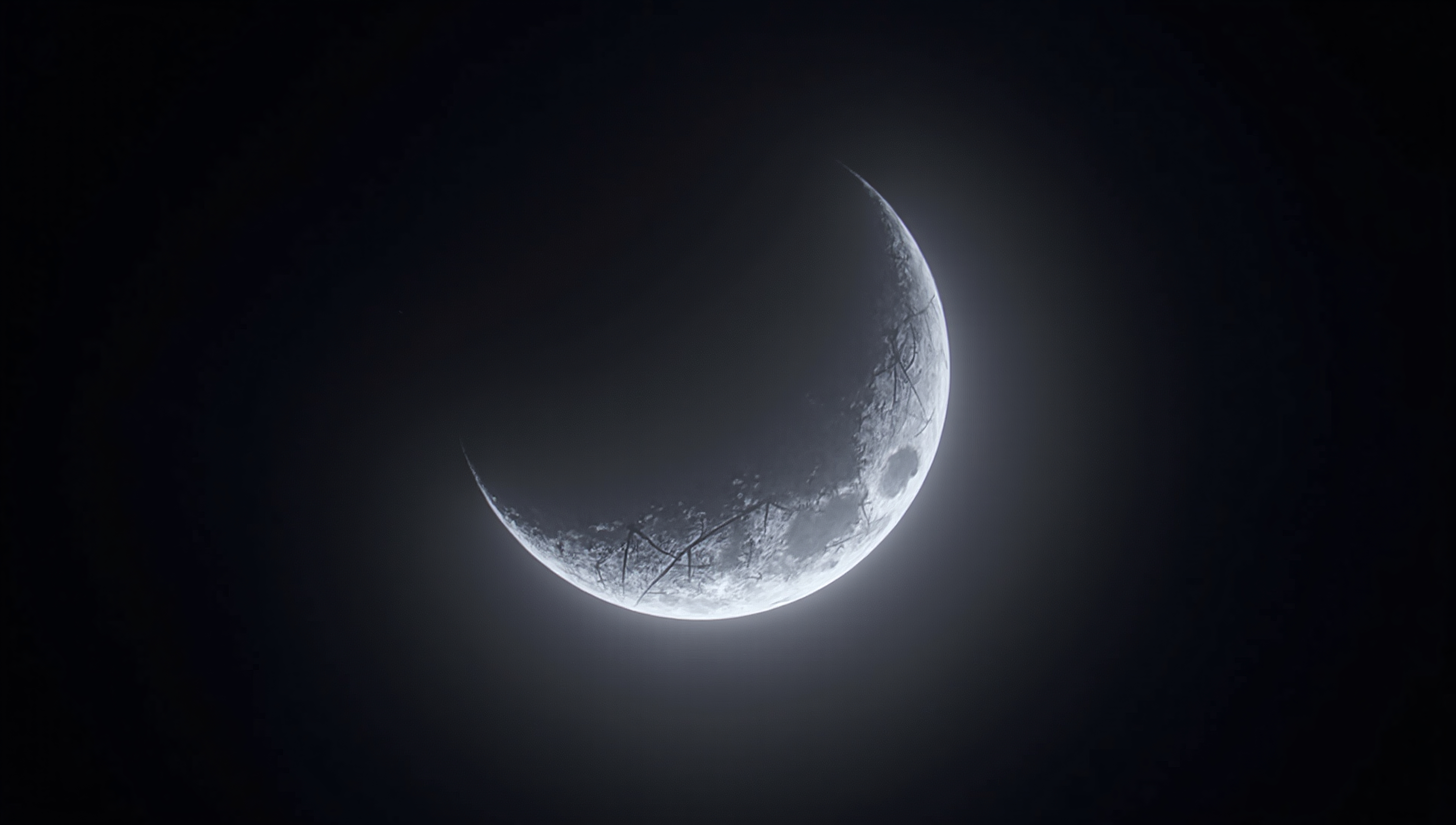 Crescent Moon Against Dark Night Sky