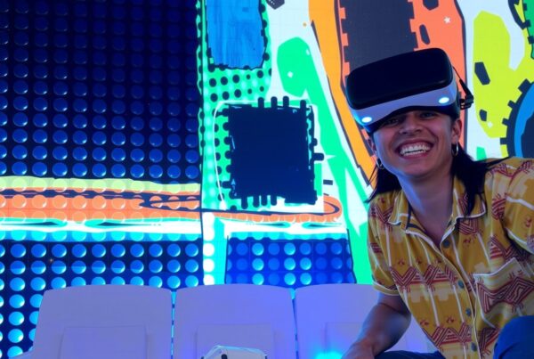 A person enjoying a VR experience in front of a colorful, abstract mural.