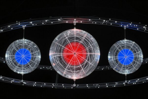 Abstract illuminated spheres against dark backdrop.