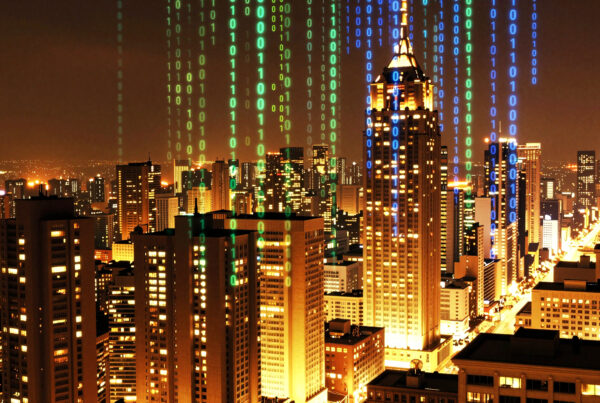 Futuristic cityscape with glowing towers and streaming digital binary code representing advanced technology integration