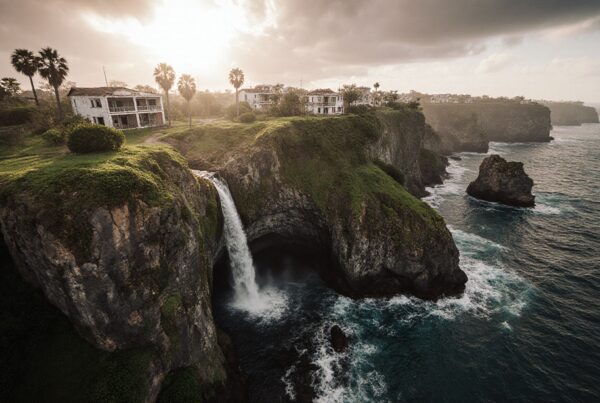 A stunning coastal cliffside with cascading waterfall into the ocean, surrounded by lush greenery and dramatic skies.