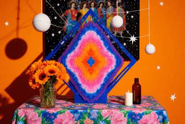 Vibrant geometric artwork with flowers and stars.