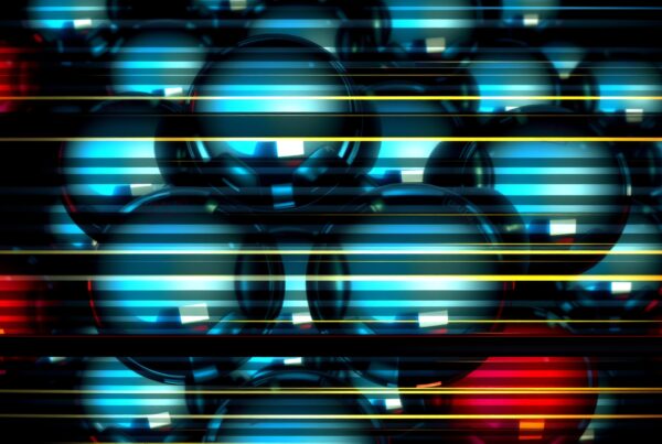 A vibrant abstract design with glossy spheres intersected by colorful stripes on a dark background.