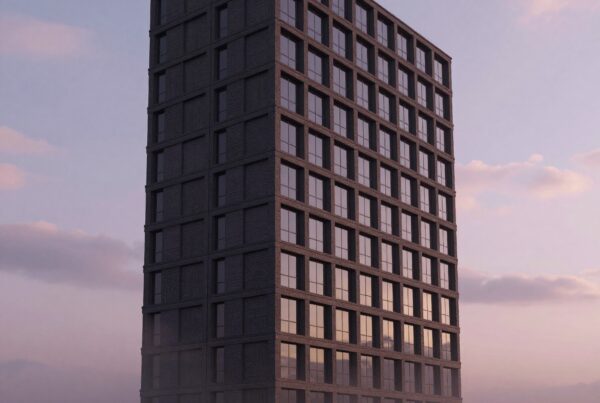 This image shows a tall, modern building silhouetted against a peaceful sunset sky.